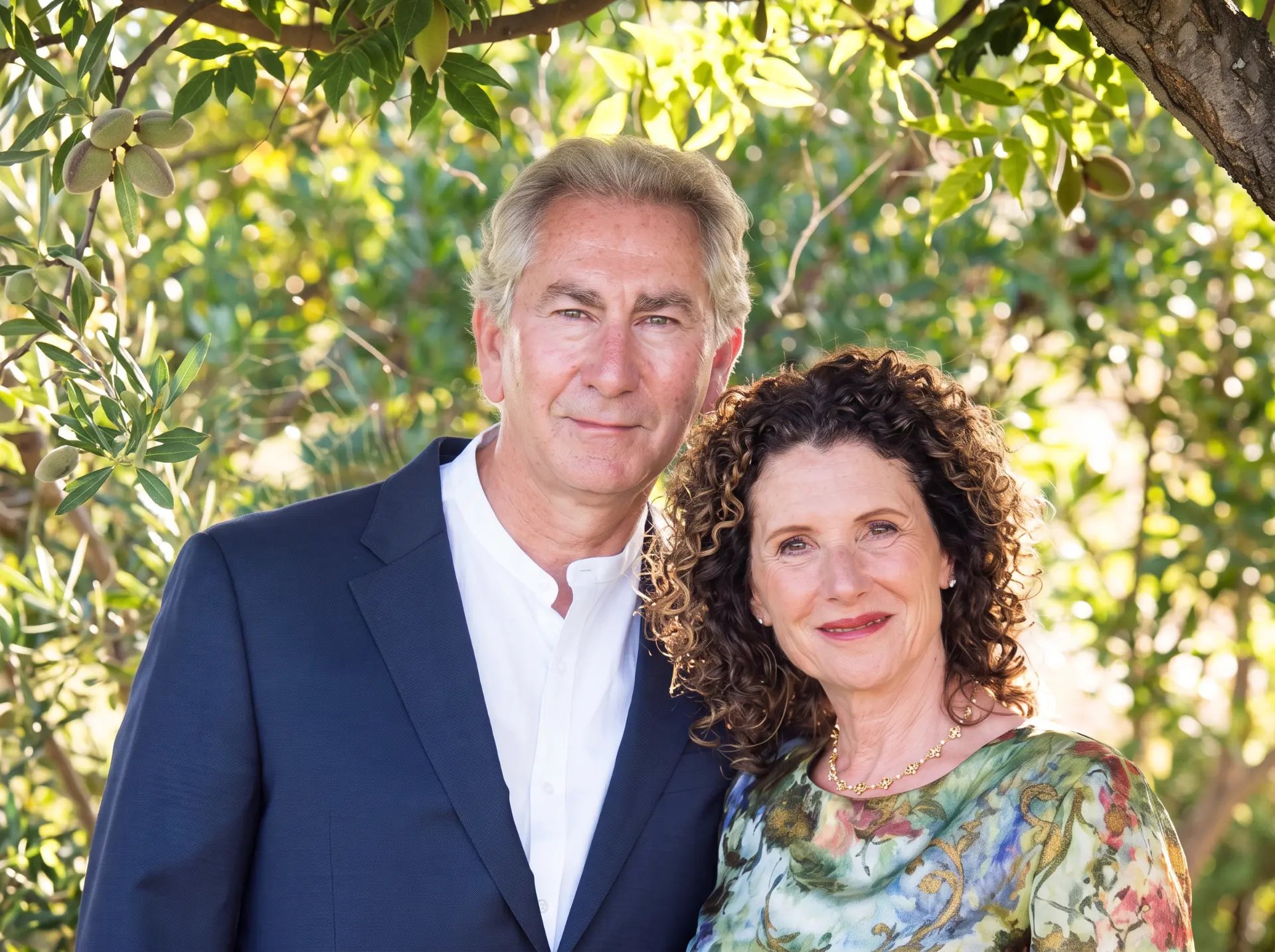Ian Morley with his wife in the garden at Wentworth Hall.