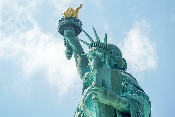 Statue of Liberty against a bright sky