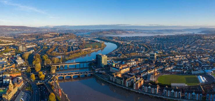 Aerial view of a British city and river